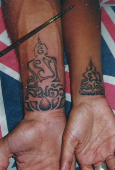 Buddha on Arms Tattoo's