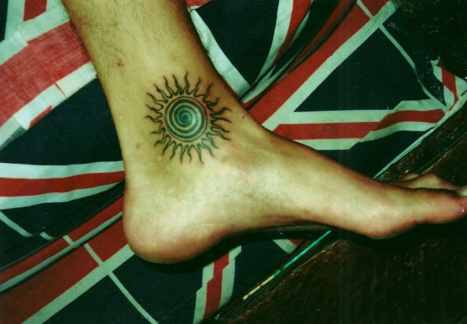 Sun Spiral Circle Tattoo Thong Nai Pan