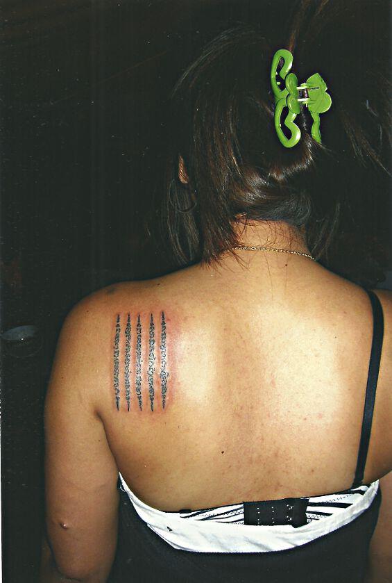 Thai Script on the Shoulder