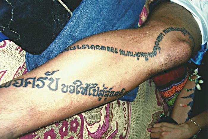 Thai Script Running Up the Leg