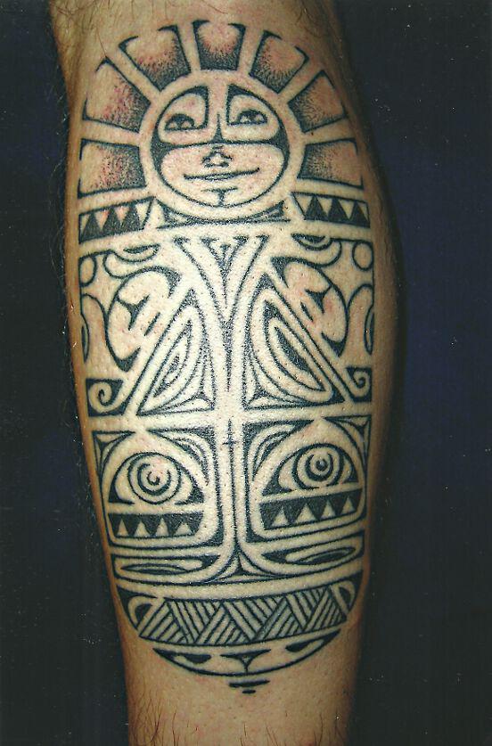 Tribal Face on Back of Leg